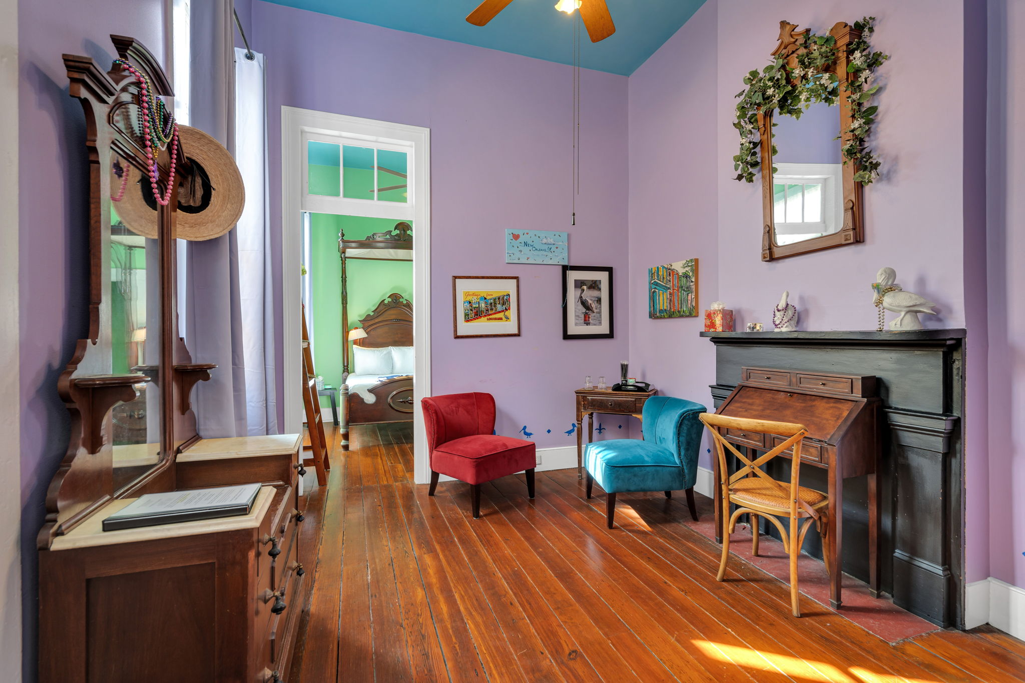 Artsy New Orleans escape featuring bold colors, vintage furniture, and unique decor.