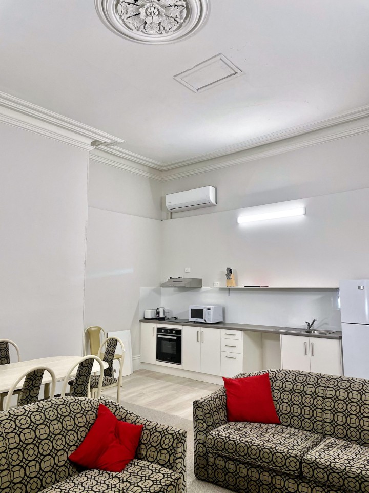 Features open-plan living and dining, a well-equipped kitchen, smart TV, split-system air conditioning, and a sleek, modern bathroom—designed for comfort and convenience.