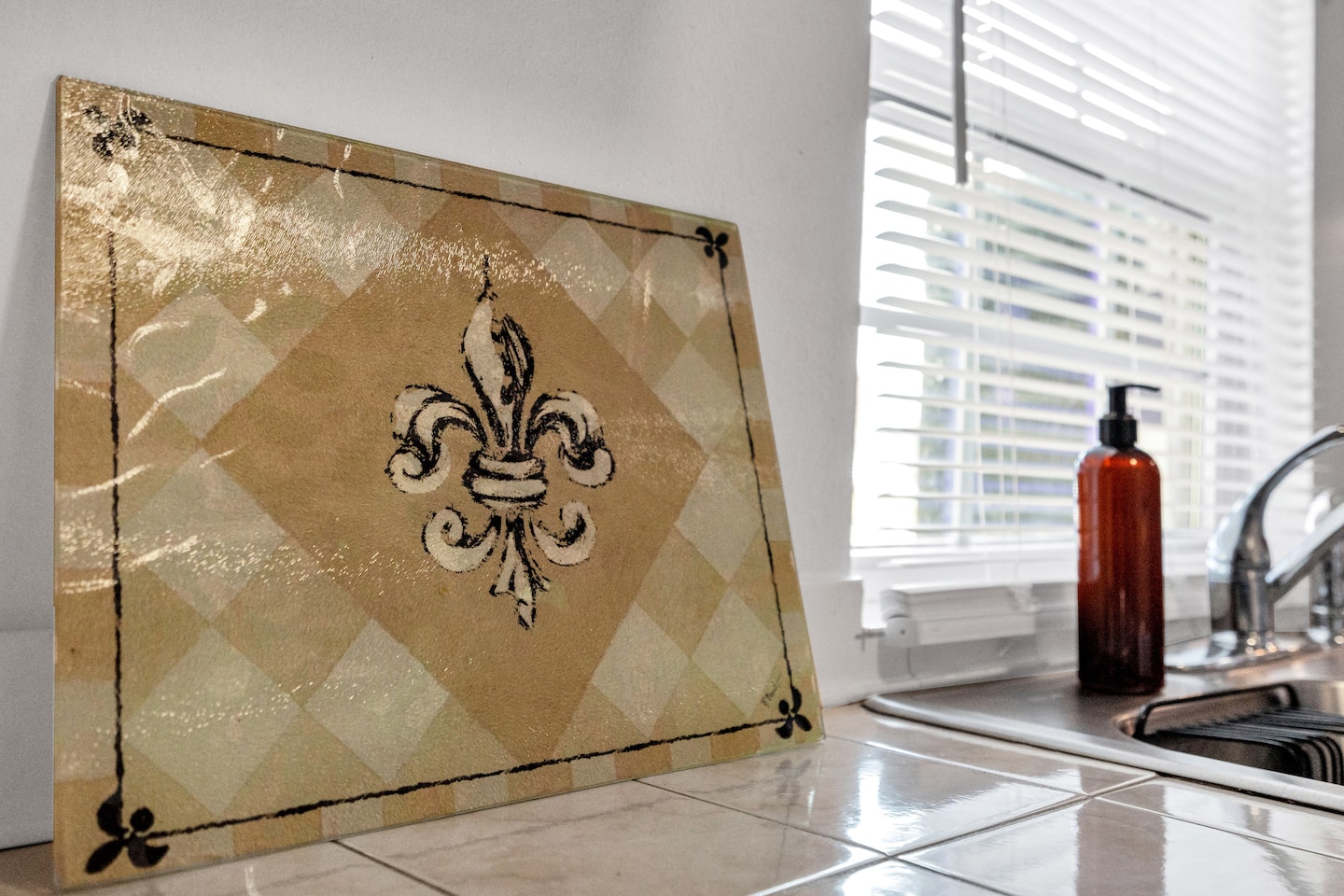 Classic fleur-de-lis artwork adds local flair