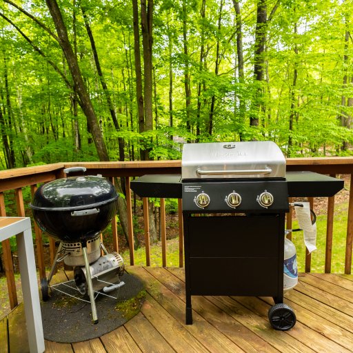 Fire up the grill on the deck and enjoy a delicious barbecue surrounded by the serene forest views