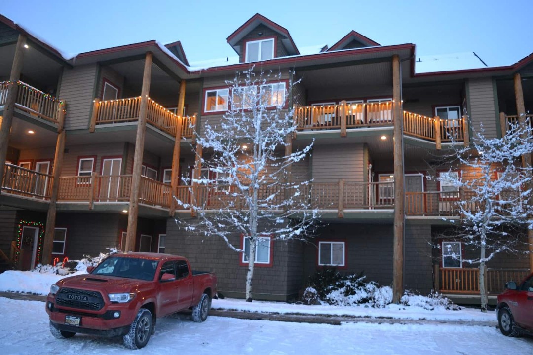 The Super Condo - seasonal lights connecting the two front decks that ...