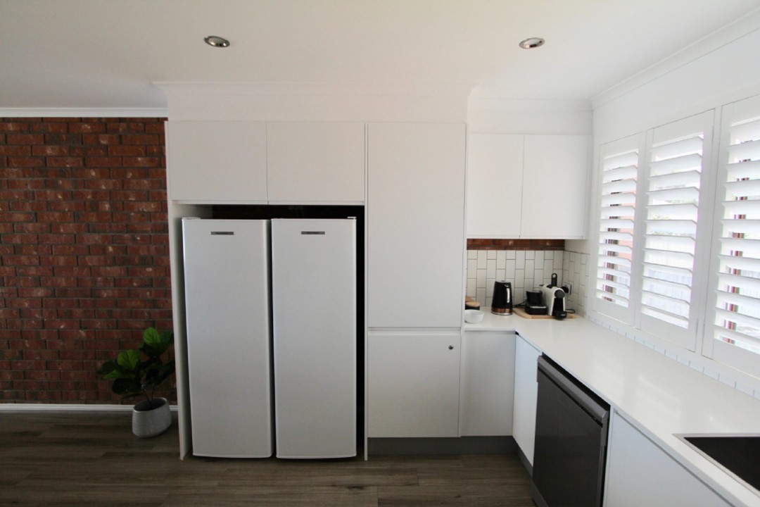 Recently renovated kitchen with modern appliances and ample bench space.
Includes oven, cooktop, microwave, kettle, fridge/freezer, and dishwasher