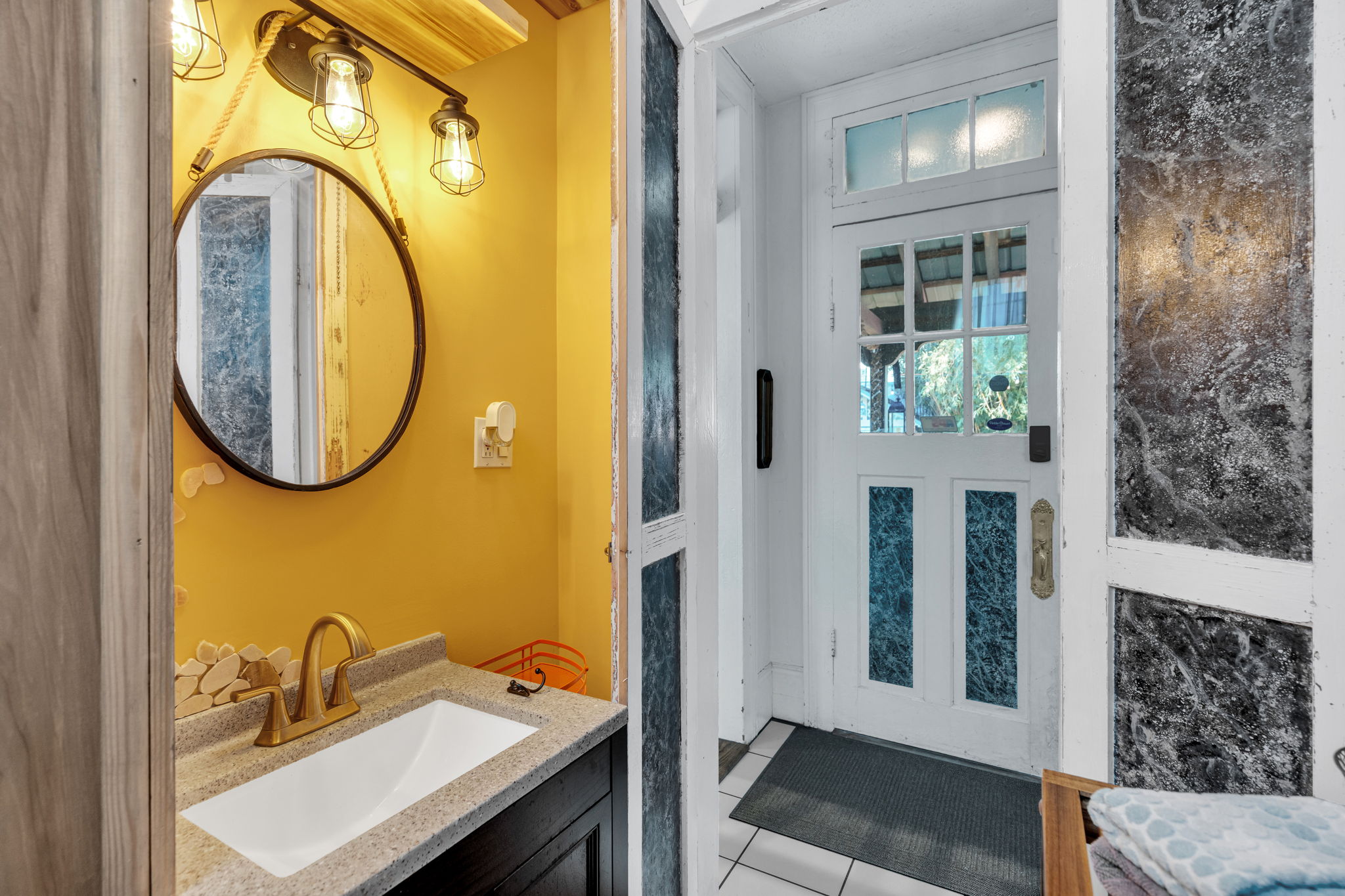 Bright bathroom with bold NOLA color