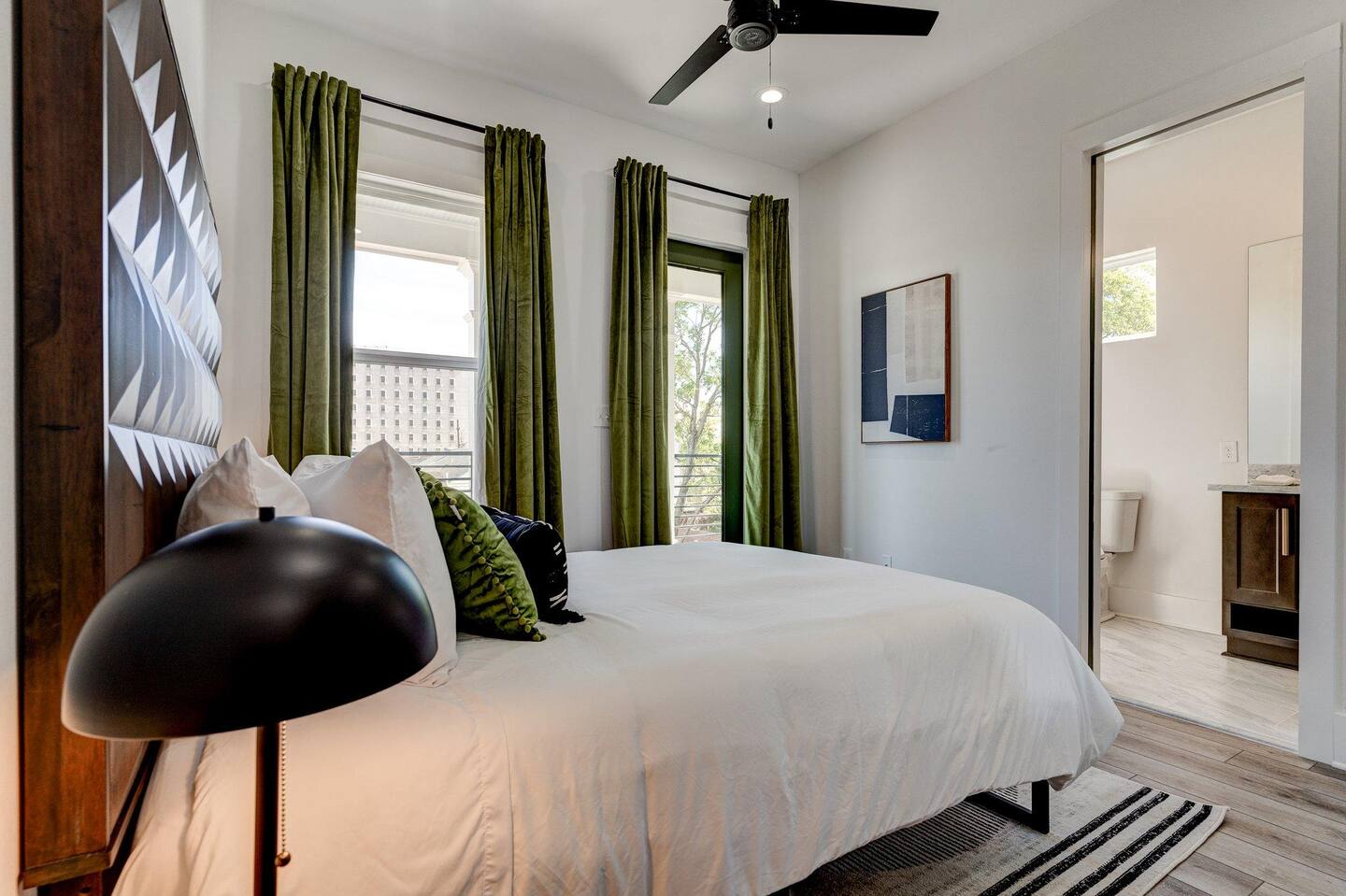 With a Jack & Jill bathroom and EXCLUSIVE access to the balcony facing downtown and the superdome this bedroom rivals even the luxurious downstairs master! (Bedroom 2/5)