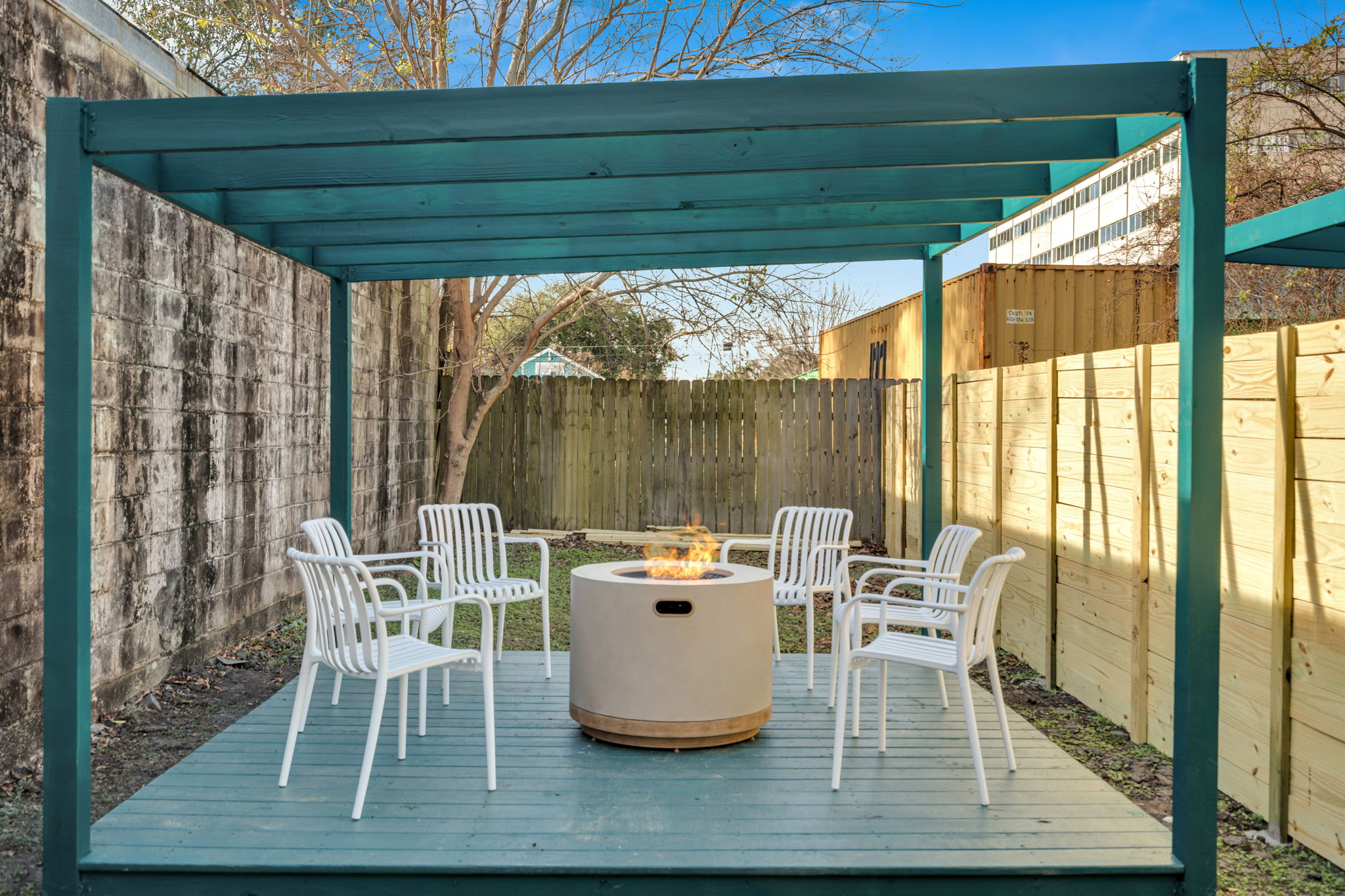 Outdoor courtyard with fire pit for laid-back evenings