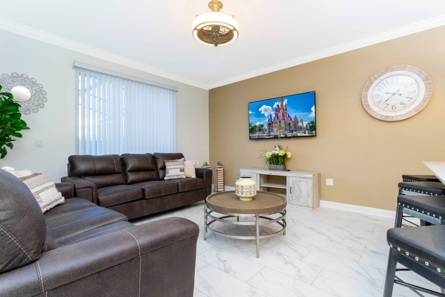 Open living space with a smart TV where you can log in with your accounts, that seamlessly connects the beautiful kitchen and dining area, offering a perfect blend of comfort and style.