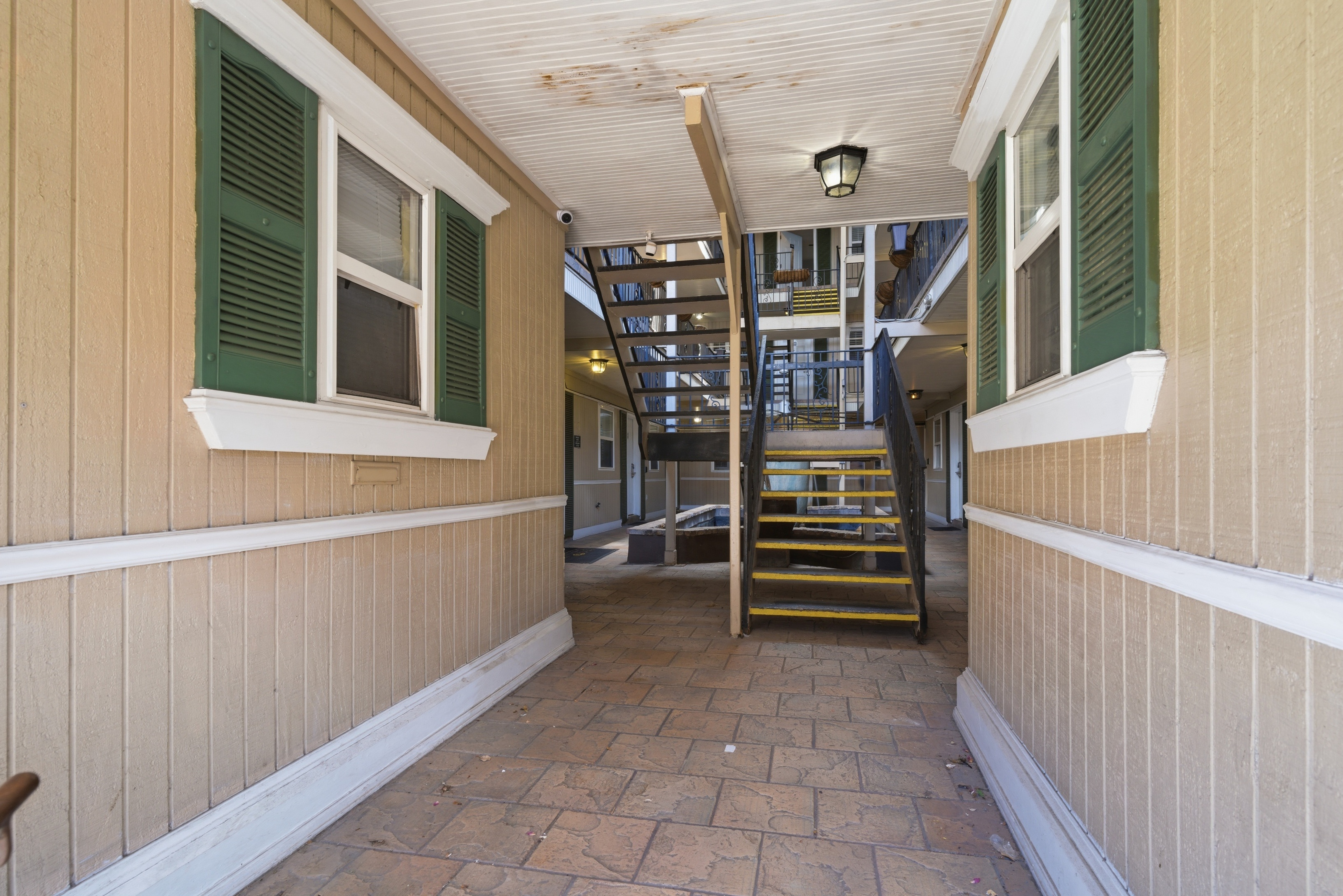 Covered walkway guiding you inside