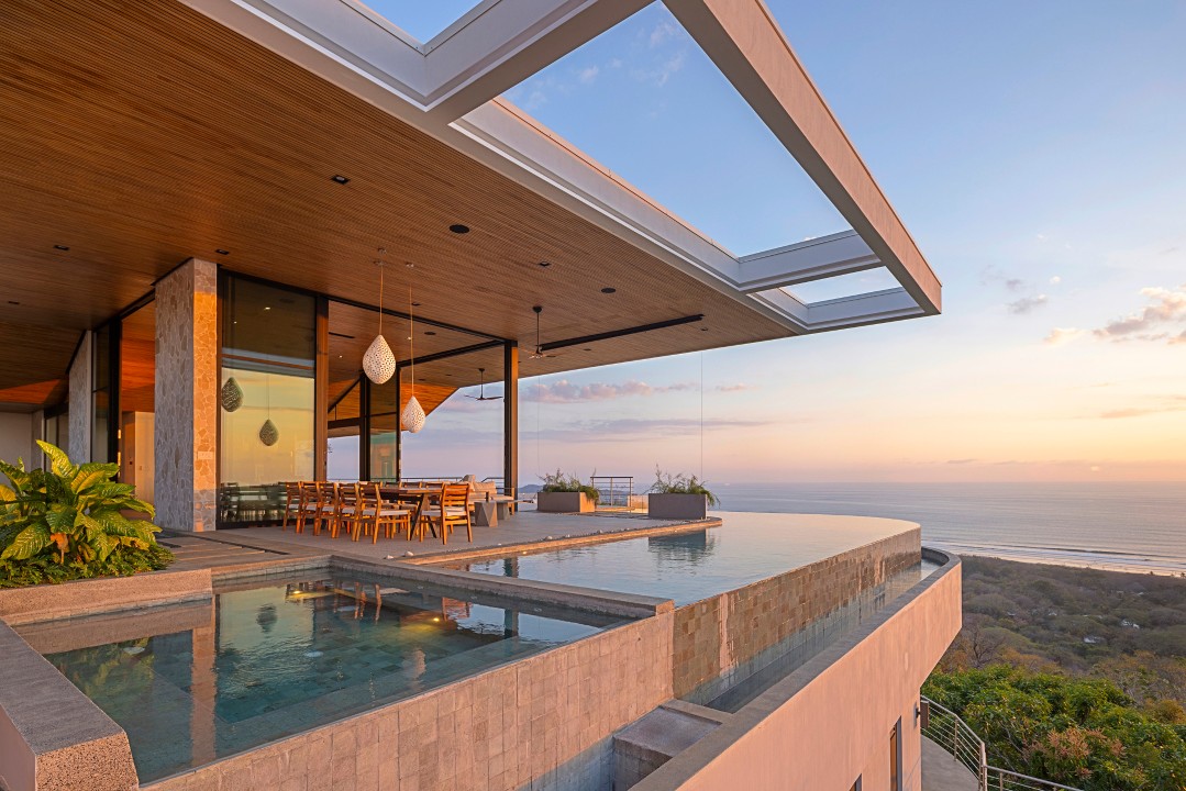 In the Villa you are greeted with a large infinity saltwater pool and ...
