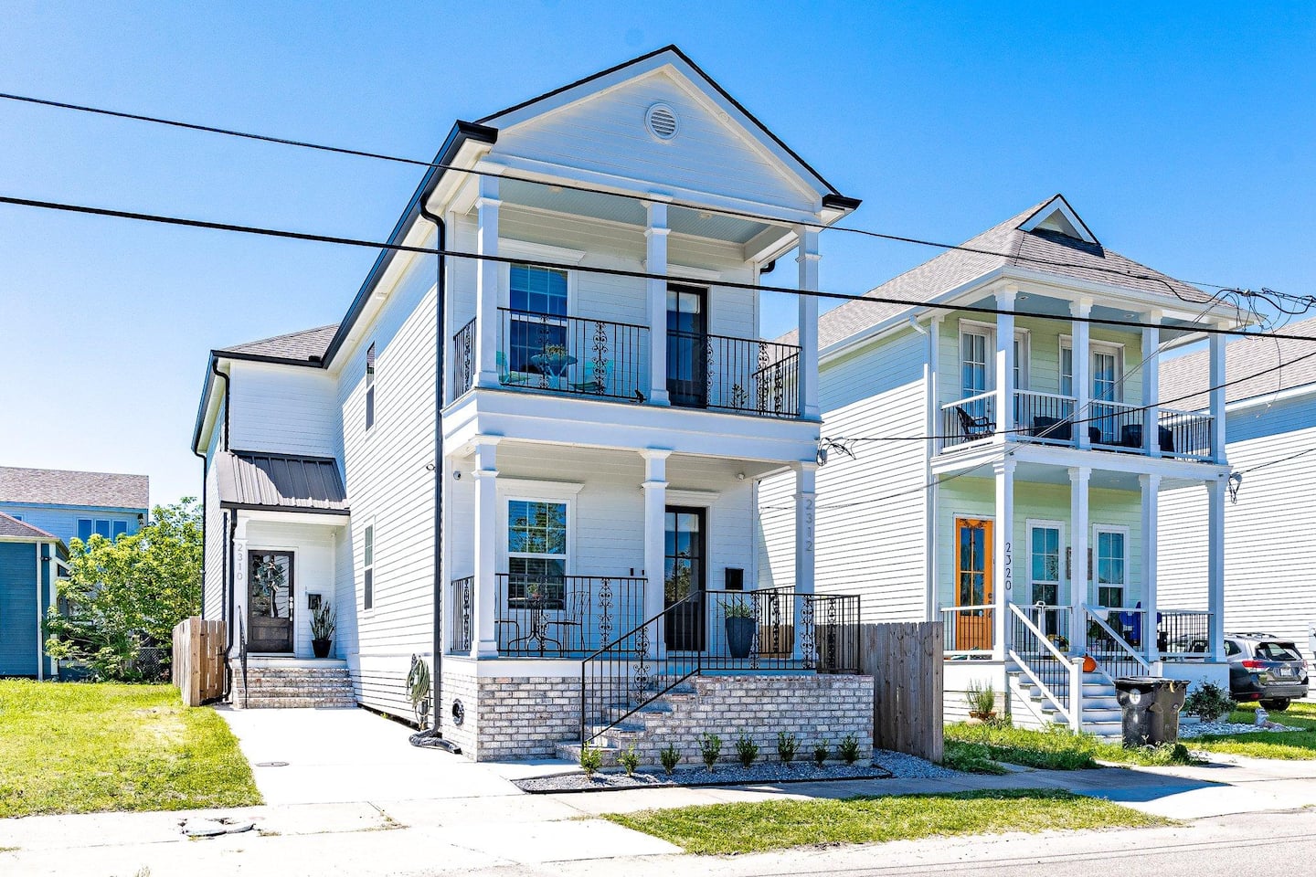 Stunning modern two-story home with inviting balconies and elegant finishes – your perfect New Orleans getaway awaits!