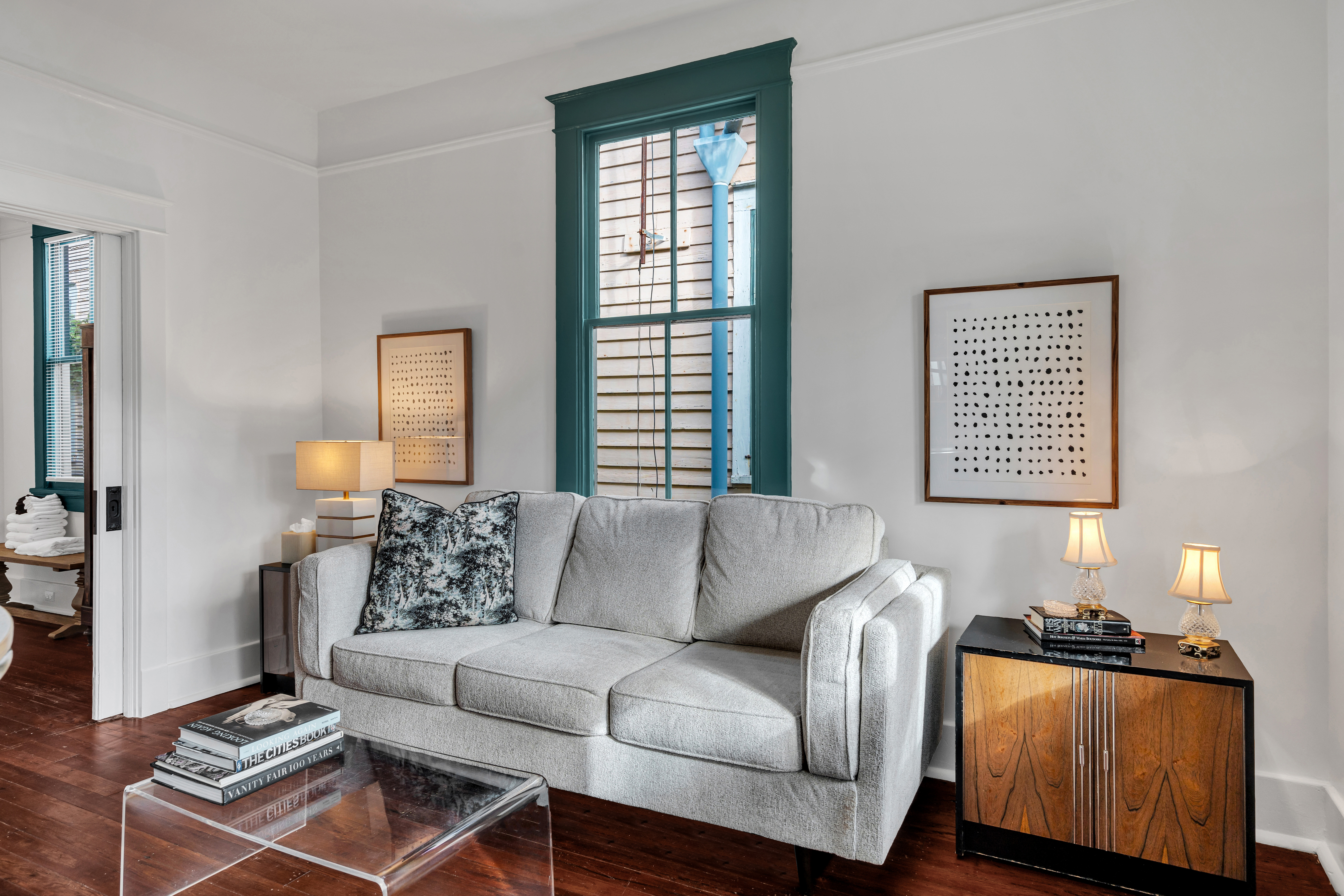 Bright living room with cozy seating and natural light
