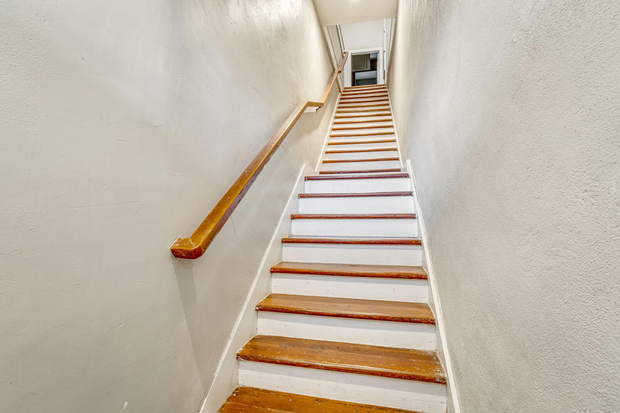 Stairway leading to second floor unit