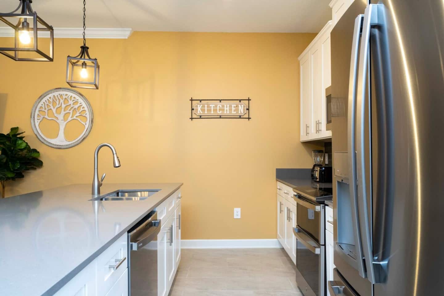 A full equipped and comfortable kitchen ready for family gatherings where you can feel as cozy as home.