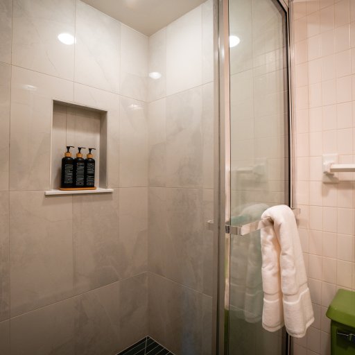 Modern bathroom with walk-in shower and clean design
