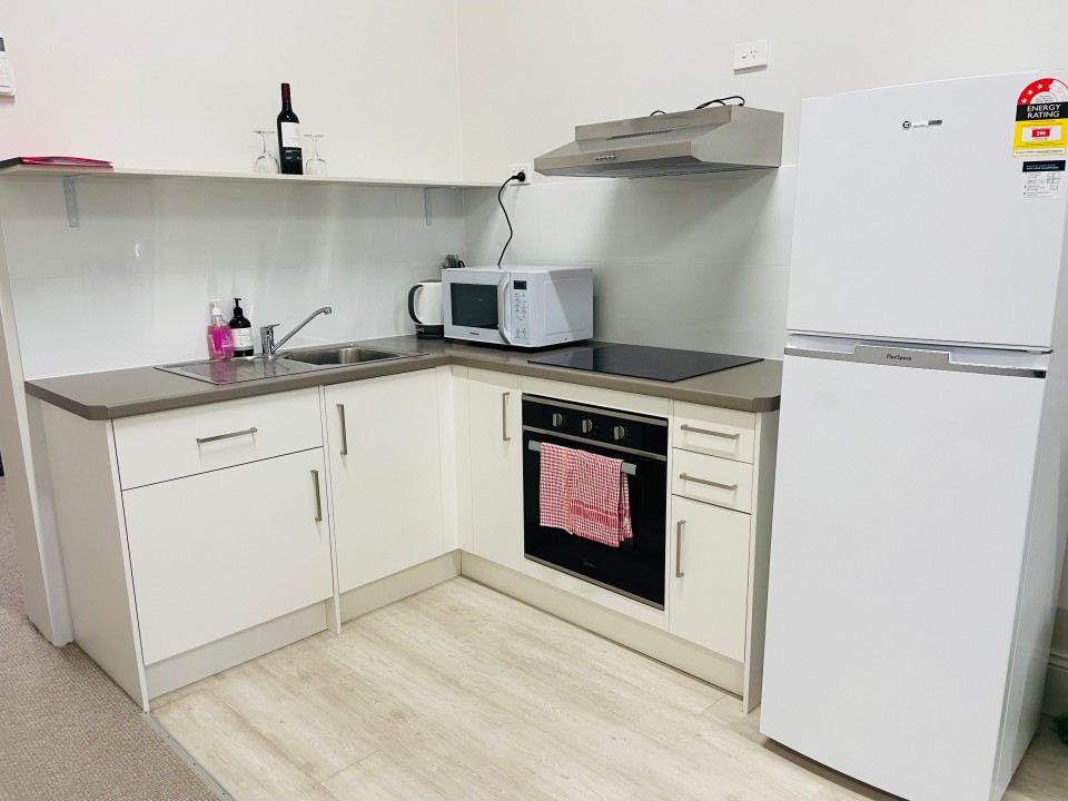 Fully Equipped Kitchens in Every Unit
Self-contained kitchens with cooktop, oven, fridge, microwave, and cooking essentials.