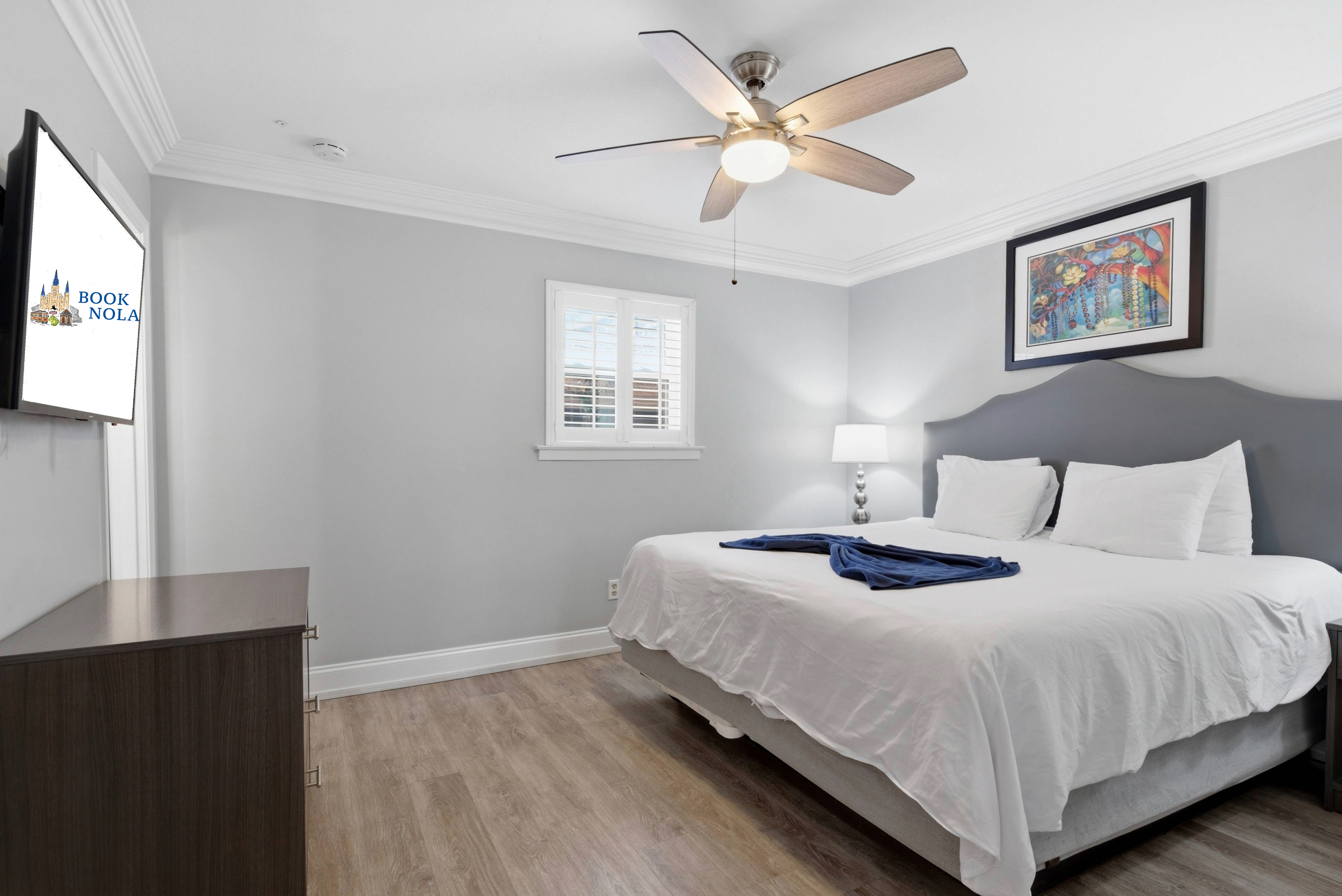 Cozy king bedroom with smart TV
