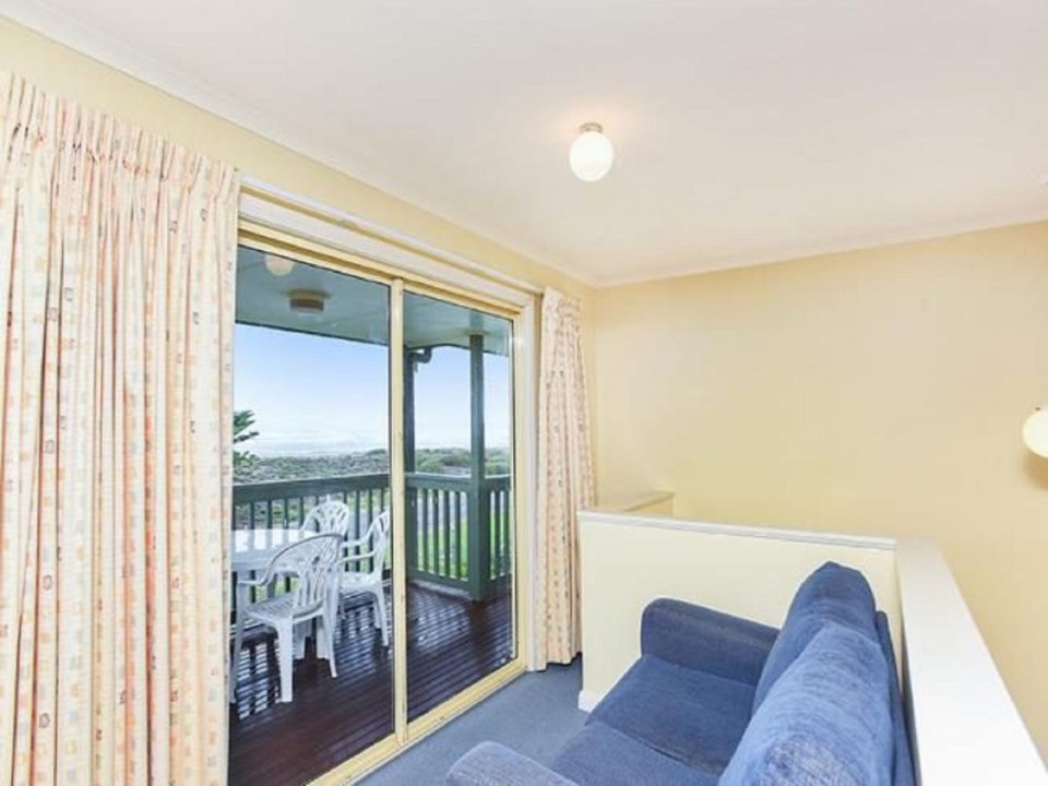 Relaxed Open-Plan Living. Comfortable and breezy with plenty of natural light. Flat-Screen TV + DVD for Nights In. You can literally hear the waves from the lounge.