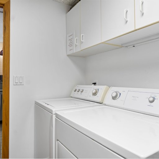 Full-size washer and dryer off the kitchen.