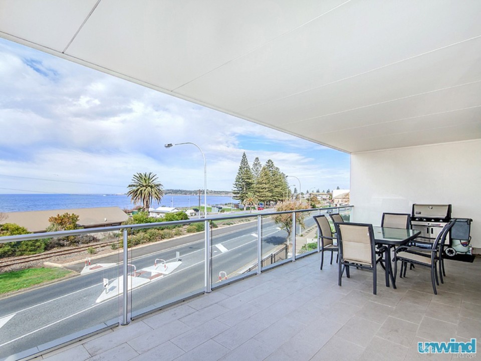 Commanding, picturesque views of the Southern Ocean and Granite Island from the private balcony.