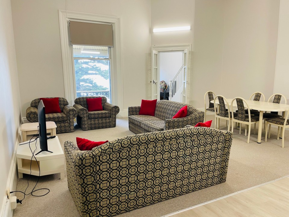 Features open-plan living and dining, a well-equipped kitchen, smart TV, split-system air conditioning, and a sleek, modern bathroom—designed for comfort and convenience.