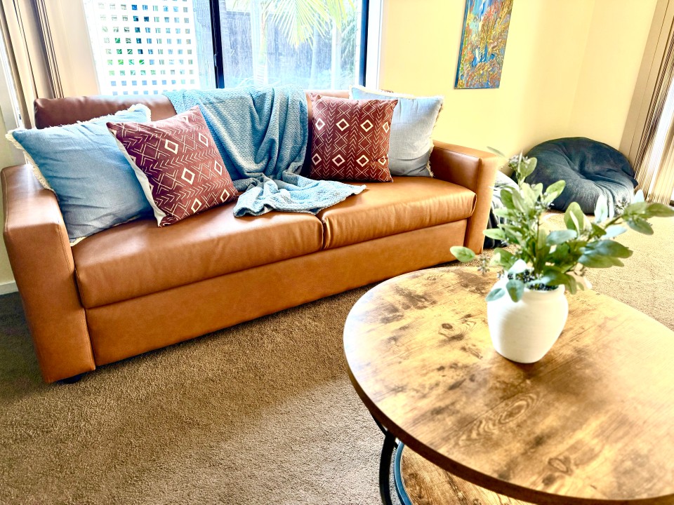 Sunlit Open-Plan Living Area
Light-filled lounge with stylish, comfortable furnishings, perfect for relaxation and communal downtime.