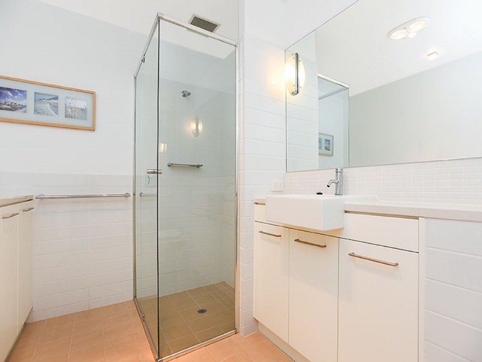 Equipped with walk-in showers and ample vanity space, providing added comfort for families or groups.