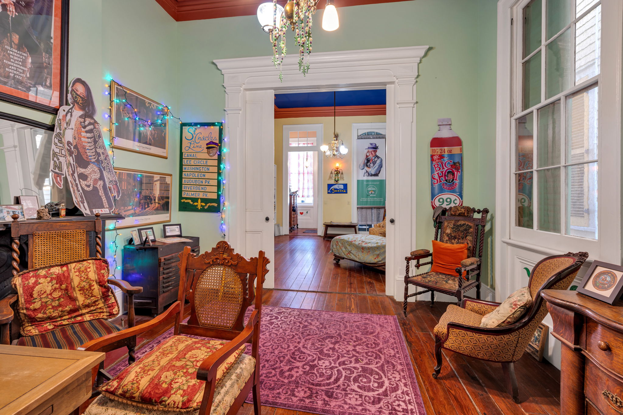 Eclectic living space filled with vintage charm, and colorful art