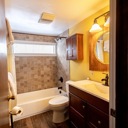 The second bathroom offers a full tub and shower, providing convenience and comfort for your group