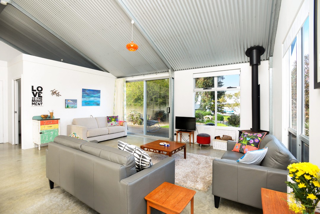 Including a wood-burning fireplace for cosy evenings, reverse-cycle air conditioning for year-round comfort, and free reliable Wi-Fi.