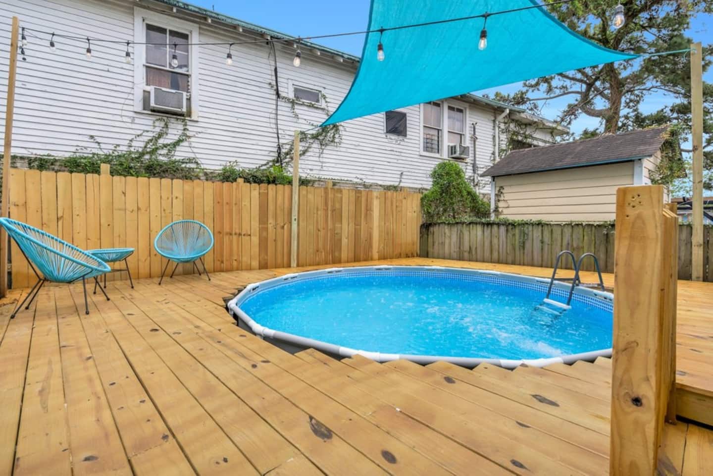 Above ground pool in backyard