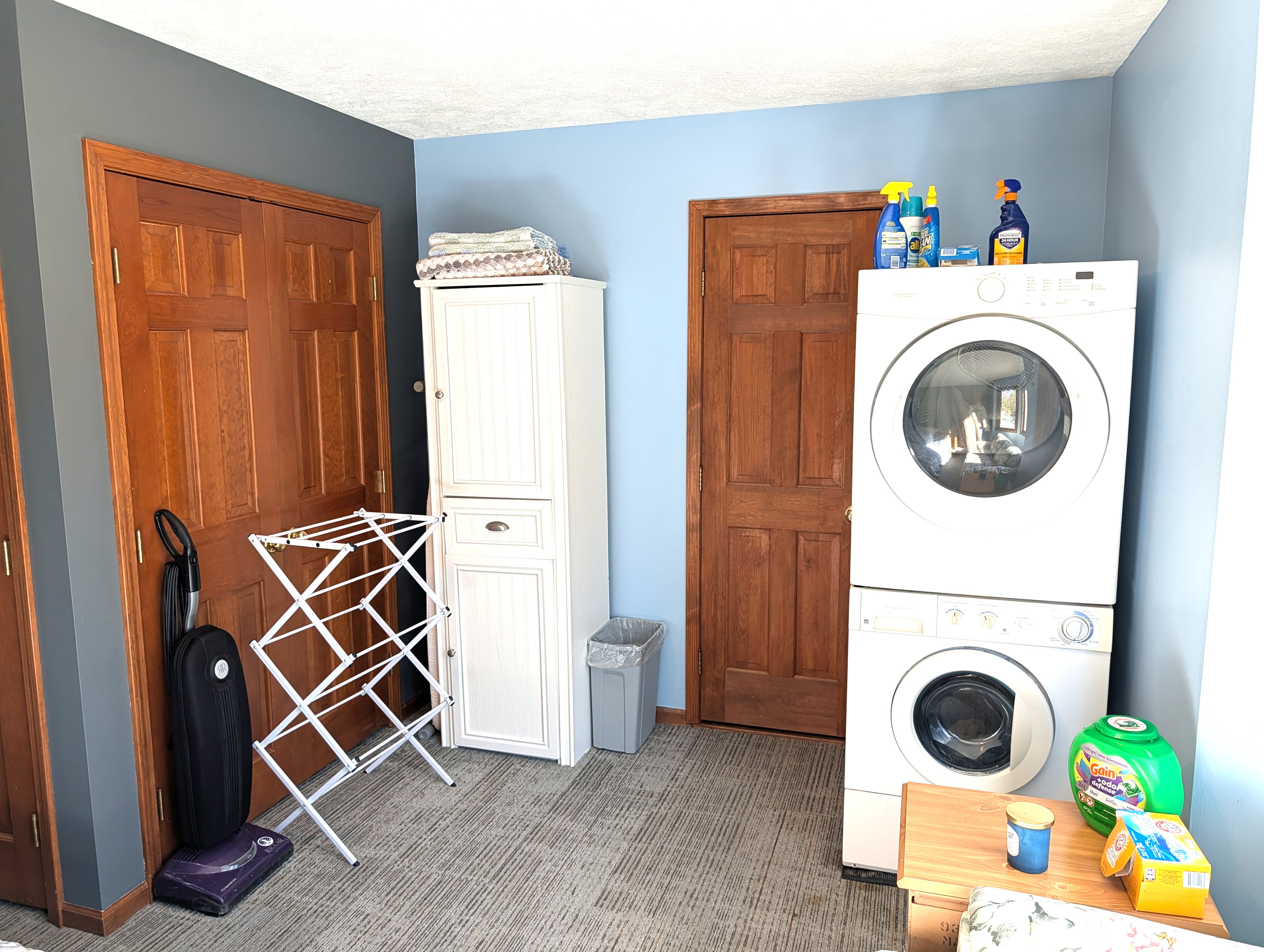 BEDROOM #5 (SECOND FLOOR):  Mixed-use bedroom on the second floor with a trundle bed, loveseat, and a washer and dryer.