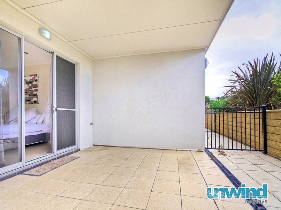 Dual balconies (upstairs and downstairs) offering expansive, uninterrupted bay views, including Granite Island and outlooks toward Port Elliot.
