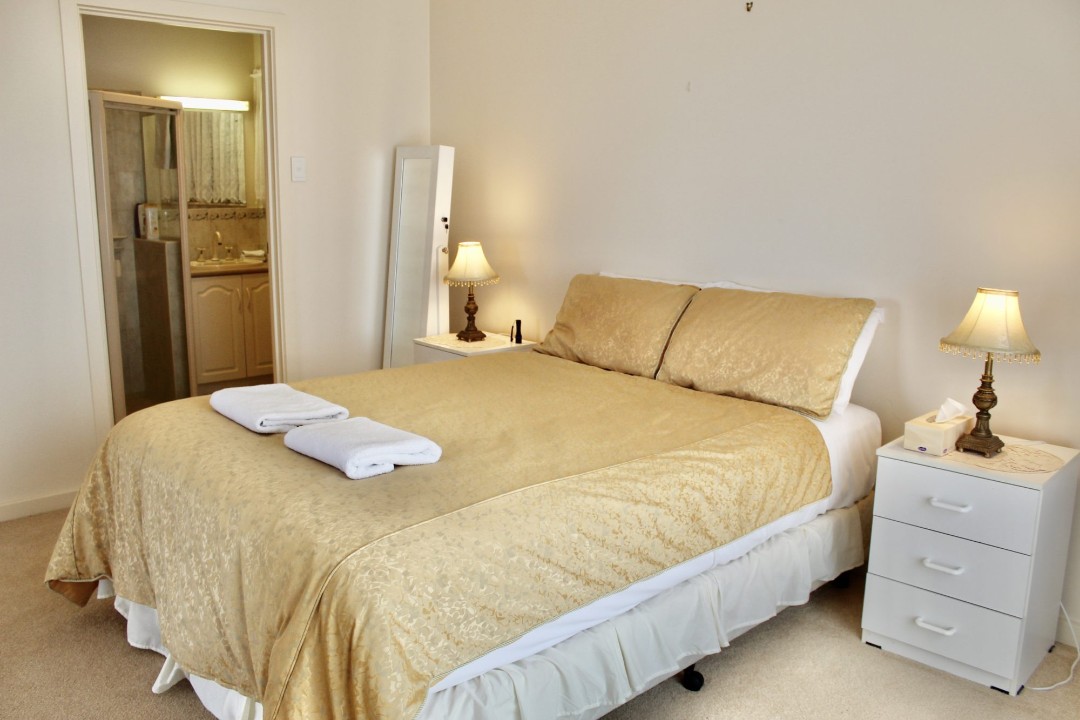 Accommodates up to 8 guests with flexible sleeping arrangements including two sofa beds, making it suitable for multi-generational stays.