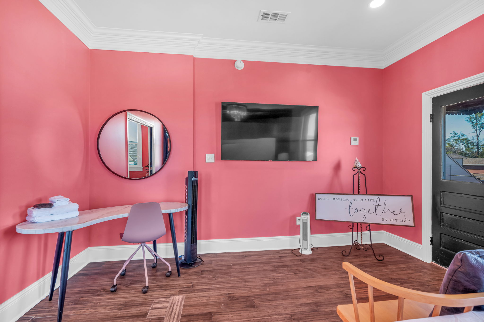 Bold pink lounge with modern touches