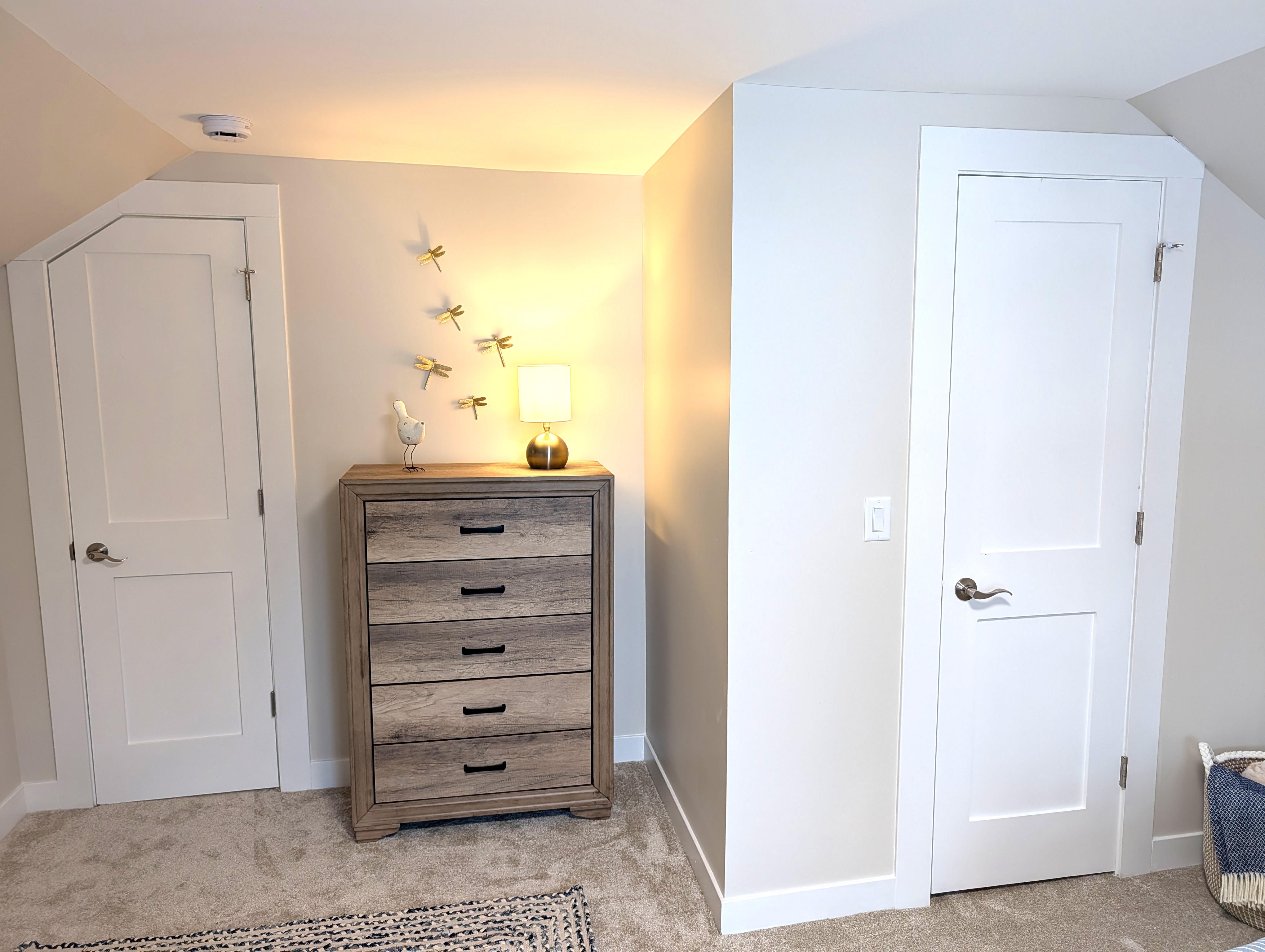 BEDROOM #2 (SECOND FLOOR):  Cute bedroom with two twin beds, table, lamp, dresser, and closet.