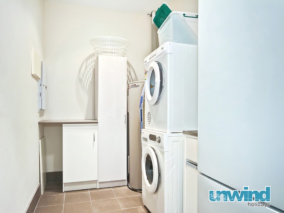 In-Unit Washing Machine: A practical amenity designed to support extended bookings and family stays, allowing guests to manage laundry needs without leaving the property.
