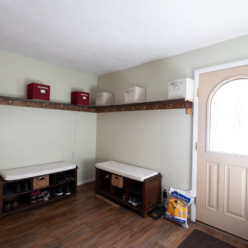 Convenient entryway and mudroom with storage space for your outdoor gear—great for snow boots, jackets, and golf clubs