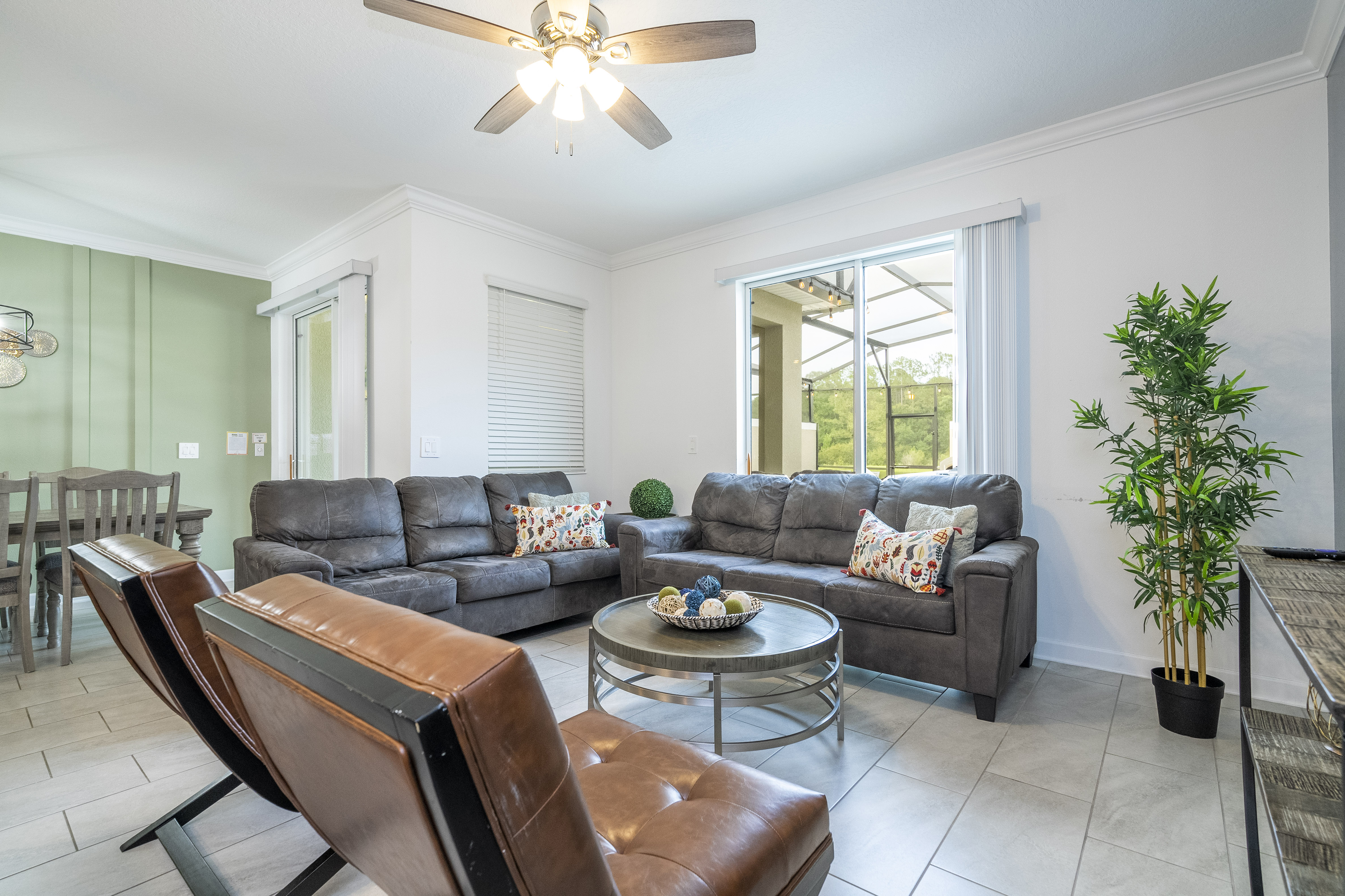 Welcome to our spacious and beautifully adorned living room, complete with a state-of-the-art smart TV where you can stream all your favorite shows. 