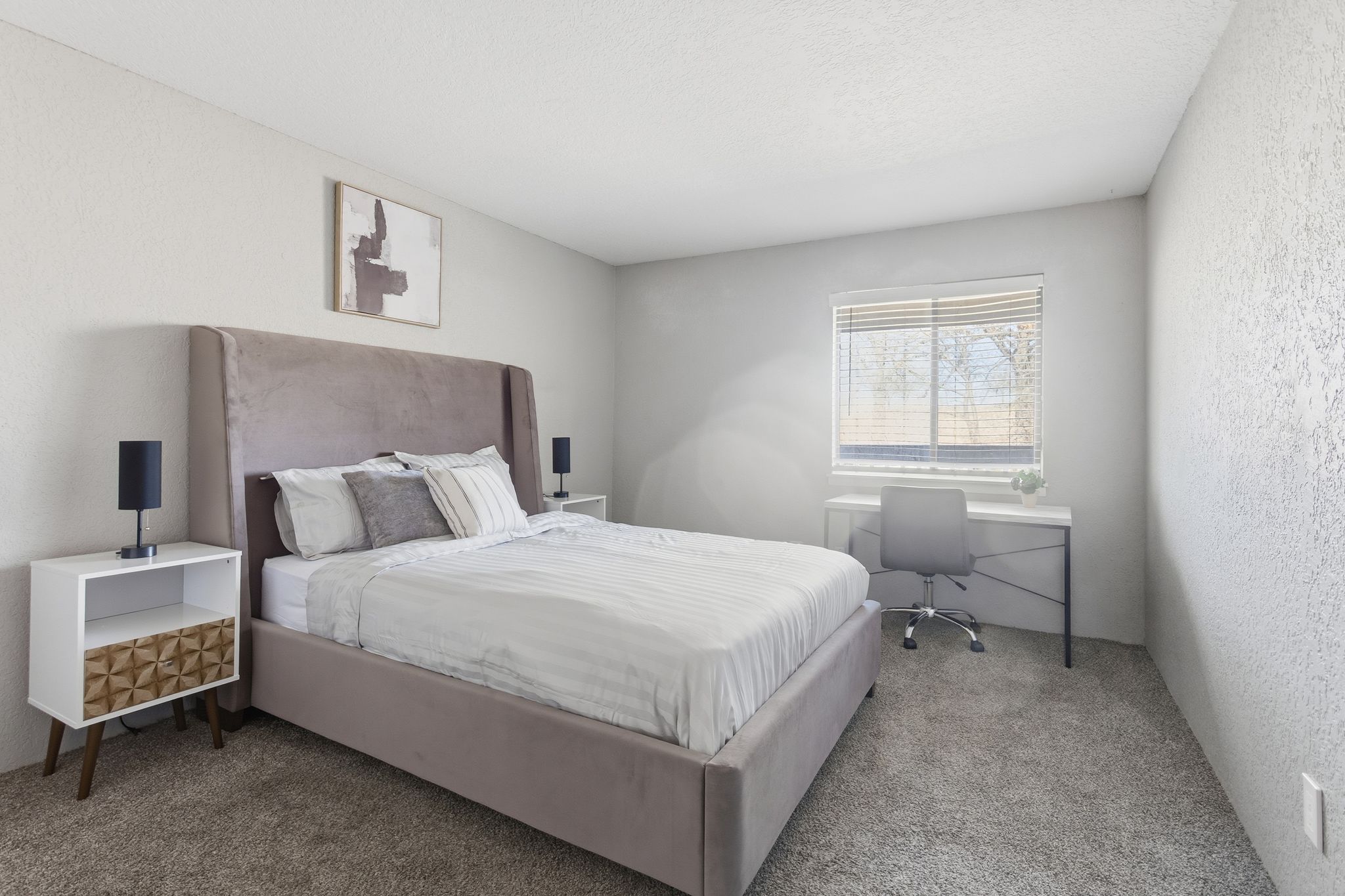 Comfortable bedroom and cozy living space in Kansas City, MO