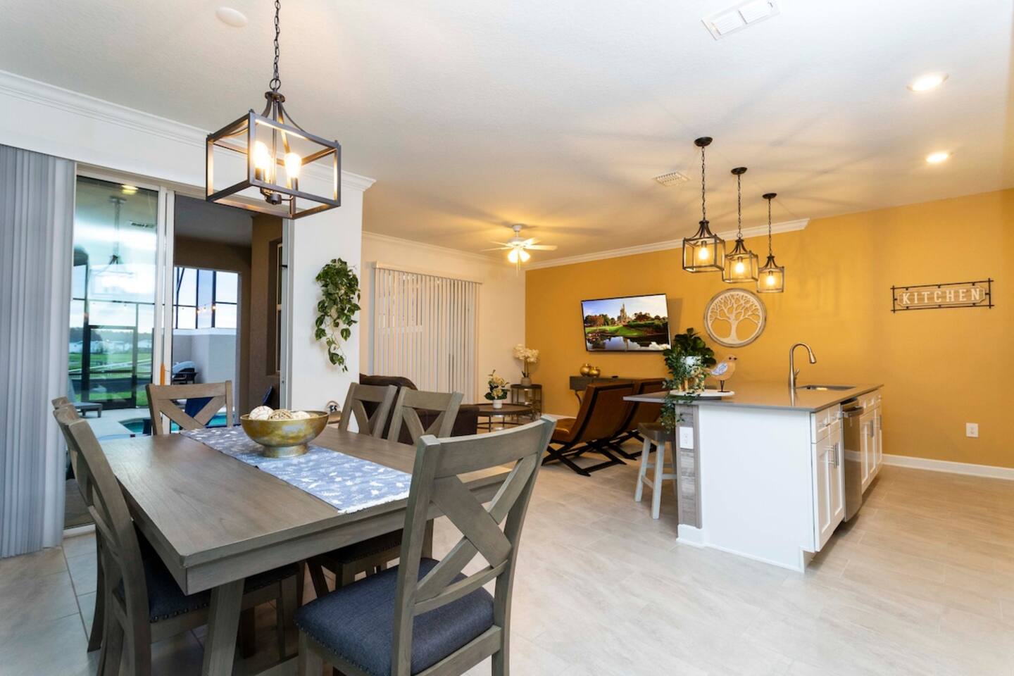 Open living space that seamlessly connects the beautiful kitchen and dining area, offering a perfect blend of comfort and style.