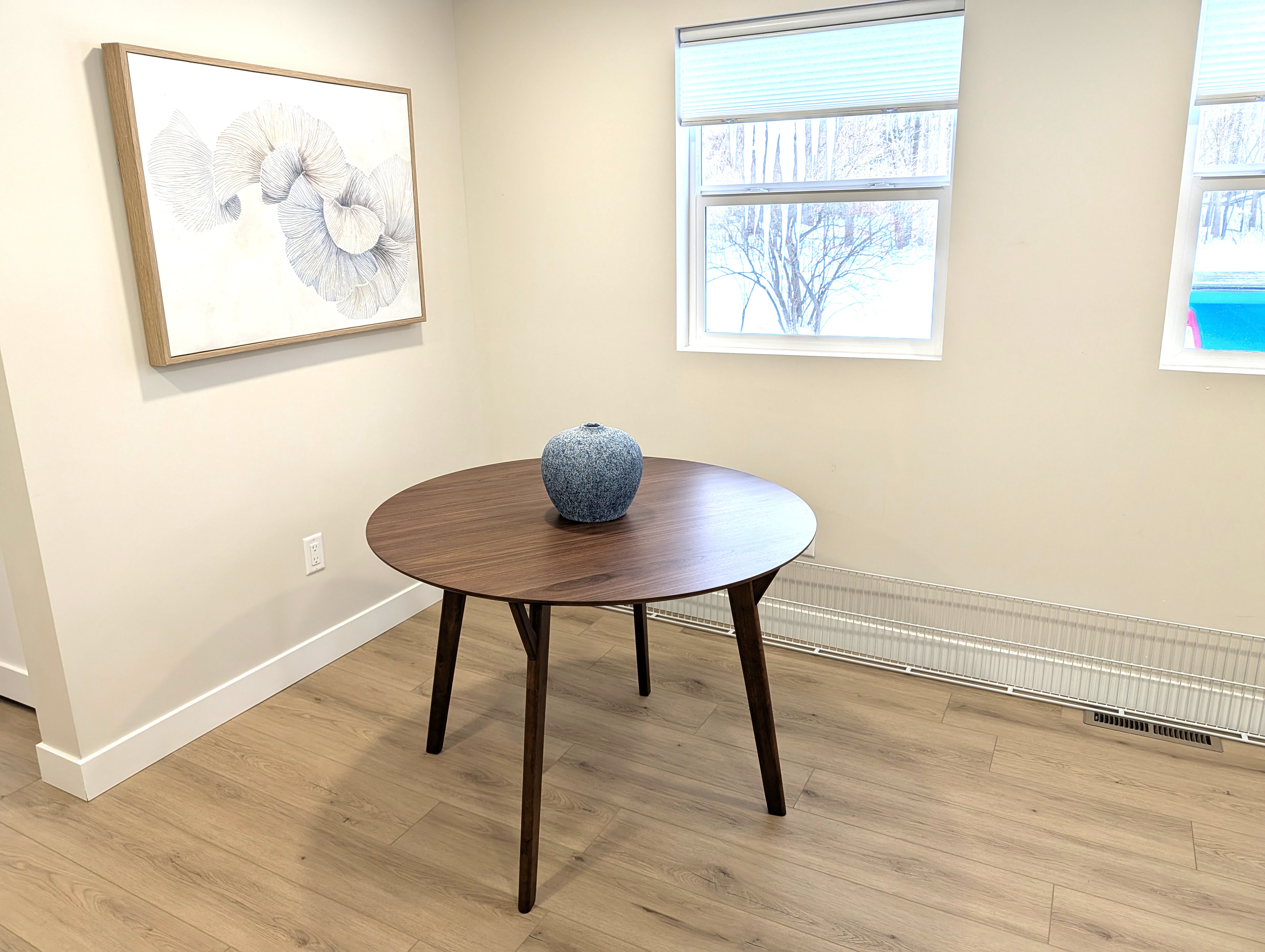 DINING AREA:  The home has a dining area next to the kitchen.  NOTE THAT 4 DINING CHAIRS ARE ON ORDER AND WILL BE IN PLACE BY APRIL 1.