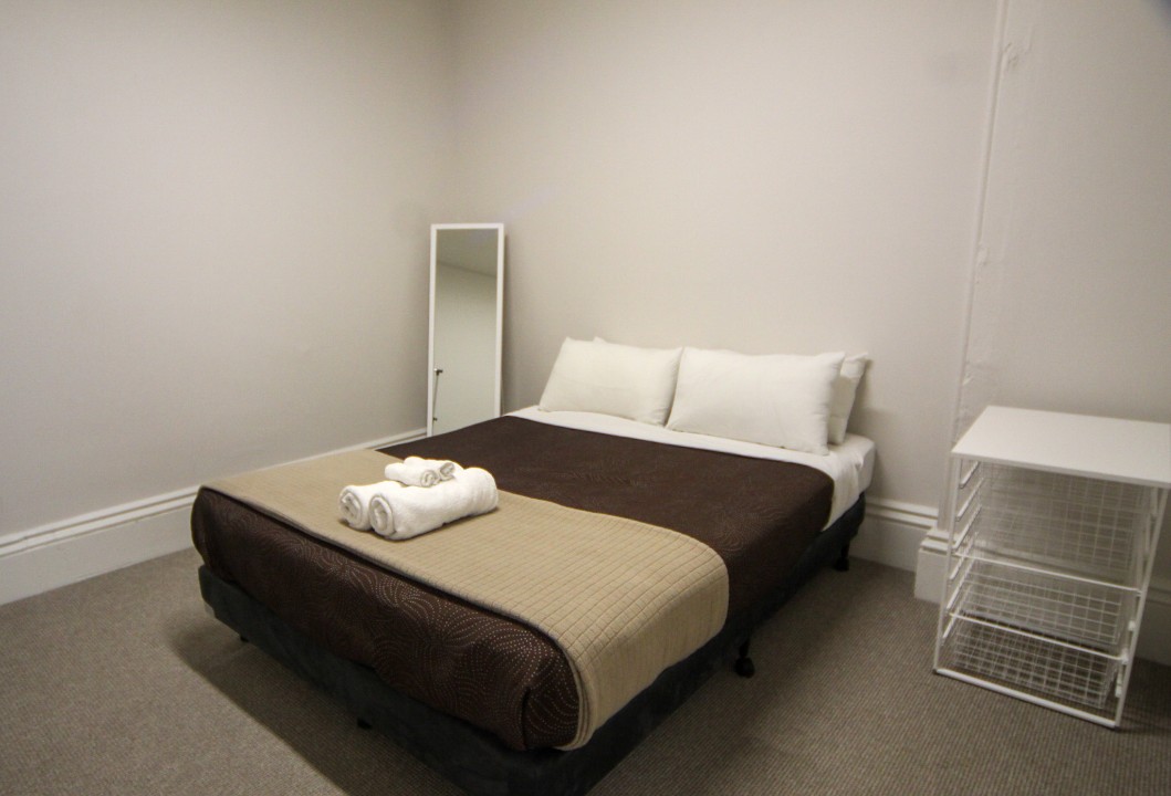 Sleeps 6-8 guests comfortably across two bedrooms plus a fold-out couch, ideal for couples or family getaways.