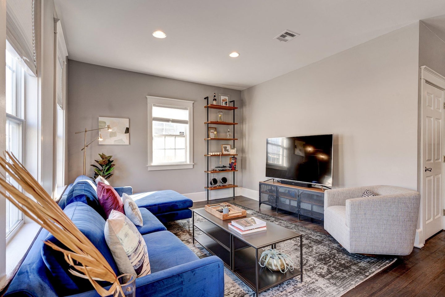 comfortable living room space equipped with a TV