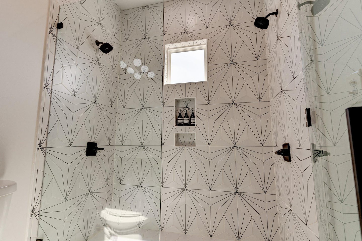 Double shower heads! Not to mention the most fabulous tile you ever could see while getting clean. (Bathroom 3.5/3.5)