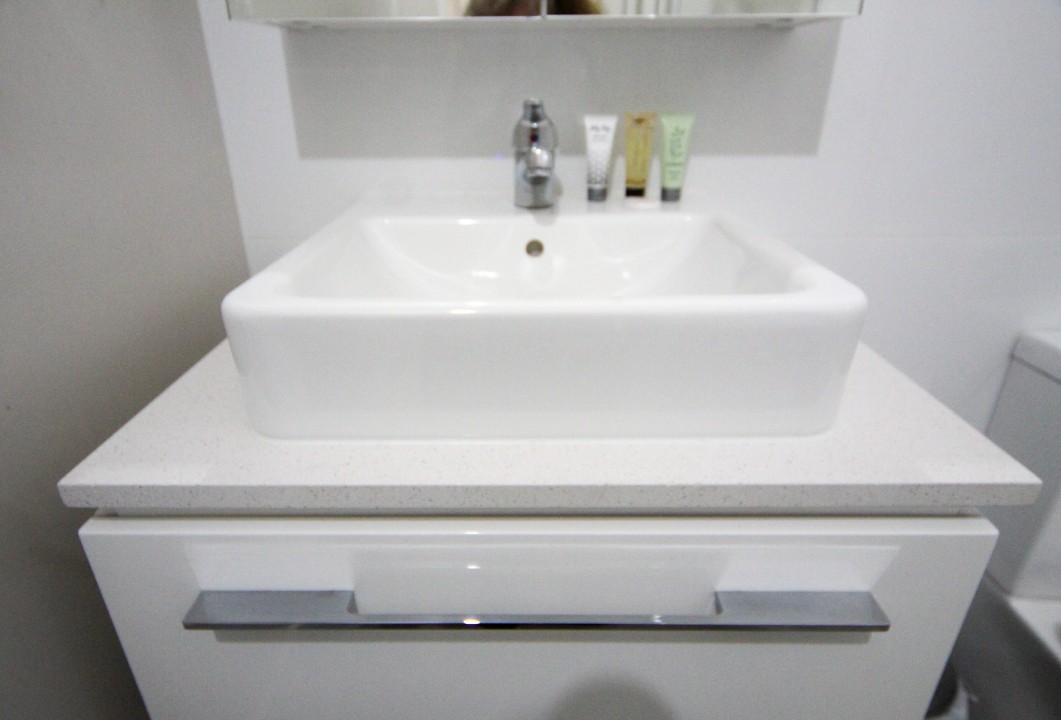 To get you started, we provide a small selection of basic supplies and welcome amenities upon check-in. These typically include essentials such as toilet paper, soap, shampoo, and a few other household basics. Please note that these items are provided as a complimentary starter pack and are not replenished throughout your stay.