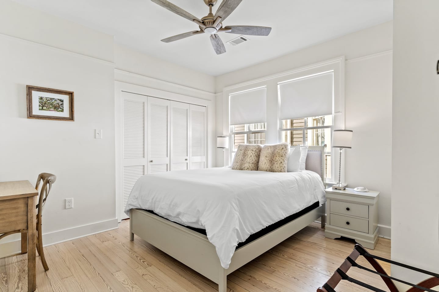 Second Bedroom| Desk provided for your use as well as closet for any storage space you might need!