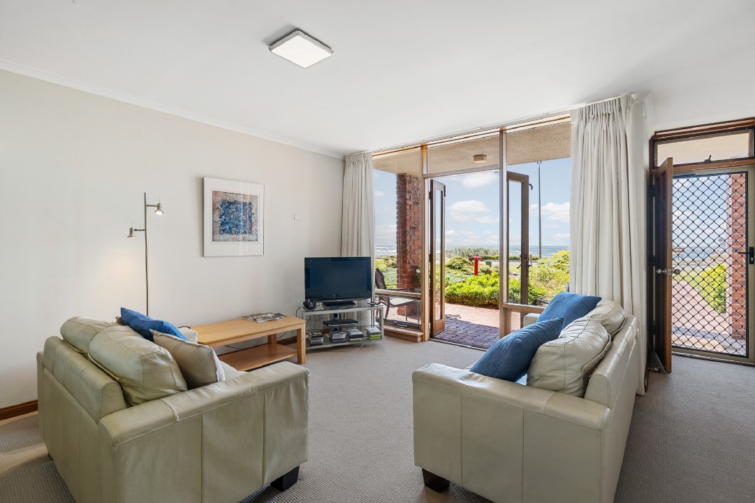 Accommodation is located on the lower level of the apartment and the balcony is not accessible, but it has a nice patio out the front looking over the sea.