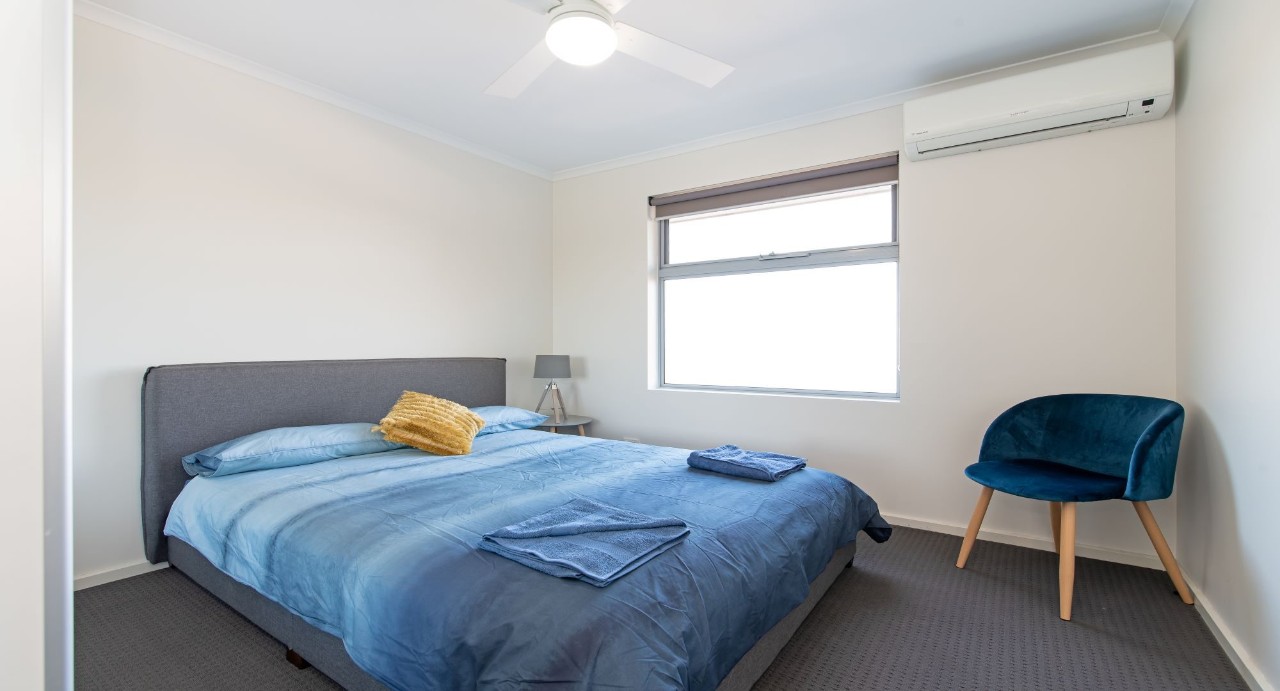 Three generous bedrooms including two queen rooms and one with twin singles. Master suite with ensuite and walk-in robe for added privacy and luxury.
