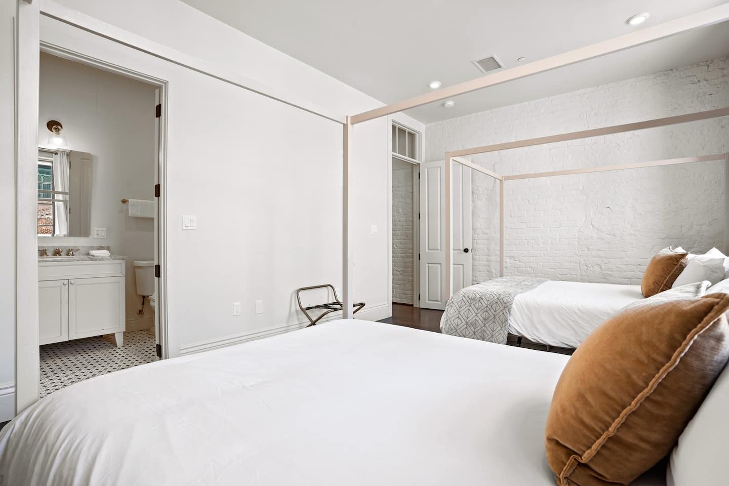 Bedroom with two queen  beds and an en suite bathroom
