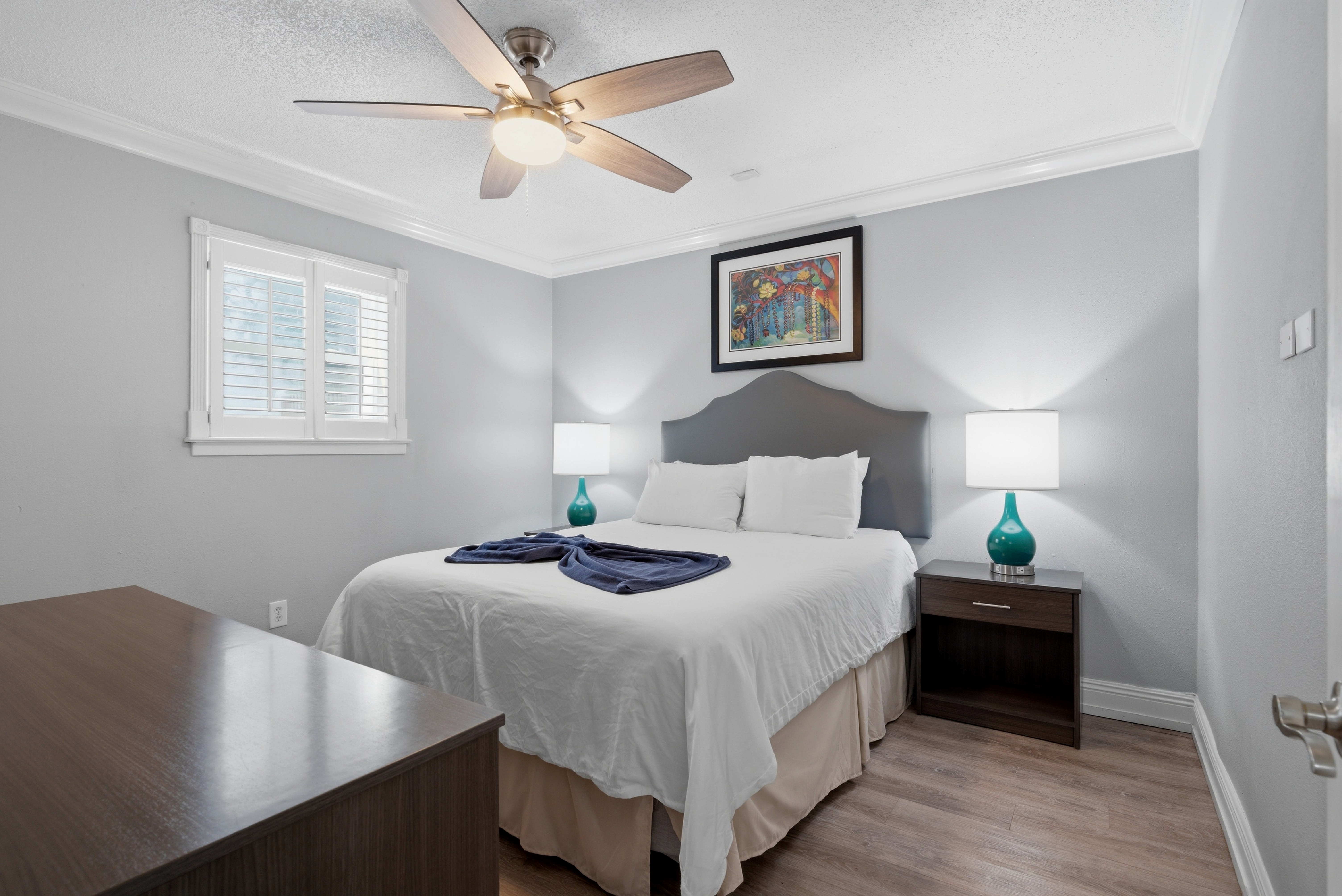 Cozy queen bed with calming tones