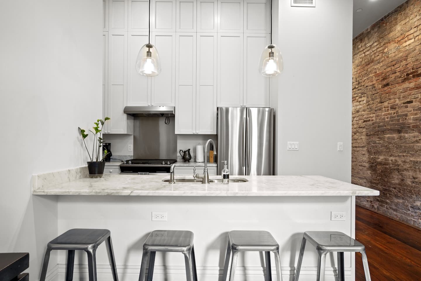 Kitchen space with bar seating